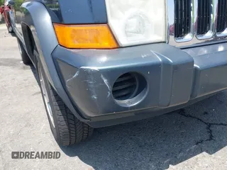 2007 Jeep Commander Sport with VIN 1J8HH48KX7C548033, listed as a IAAI auction lot 42555217 with 213,236 mi miles and . Bid and sale history available at DreamBid. Image 17.