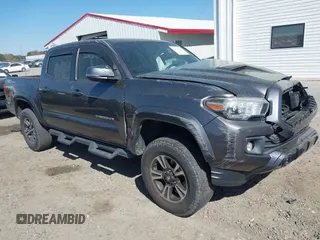 2017 Toyota Tacoma SR5 with VIN 5TFAZ5CN7HX033594, listed as a IAAI auction lot 41881117 with 86,676 mi miles and . Bid and sale history available at carsss.com. Image 1.