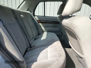 2004 Mercury Grand Marquis GS z VIN 2MEFM74W84X607050, wystawiony jako Copart lot #52303045 z przebiegiem 194 215 mil mil oraz Szkoda całkowita • Salvage title. Historia ofert i sprzedaży dostępna na DreamBid. Obrazek 10.