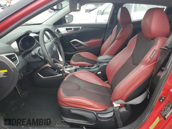 2012 Hyundai Veloster w/Gray Int with VIN KMHTC6AD1CU064985, listed as a Copart auction lot 42487355 with 84,475 mi miles and Salvage title. Bid and sale history available at DreamBid. Image 7.
