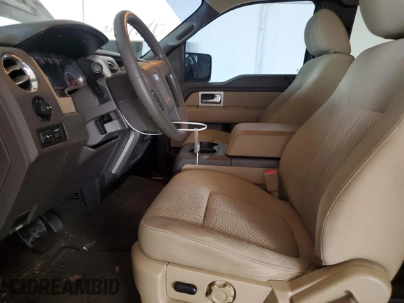 2010 Ford F-150 XL with VIN 1FTFX1CV0AFA82944, listed as a Copart auction lot 62912345 with 104,967 mi miles and Salvage title. Bid and sale history available at DreamBid. Image 7.