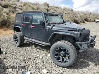2010 Jeep Wrangler Unlimited Sahara with VIN 1J4HA5H13AL182071, listed as a Copart auction lot 51696665 with 178,026 mi miles and Salvage Title. Bid and sale history available at carsss.com. Image 4.