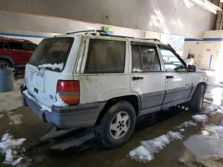 1993 Jeep Grand Cherokee Laredo with VIN 1J4GZ58Y2PC658787, listed as a Copart auction lot 41687765 with 166,262 mi miles and Salvage Title. Bid and sale history available at carsss.com. Image 3.