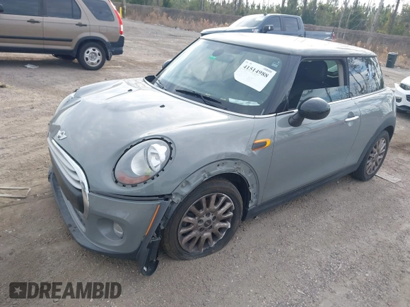 2015 MINI Hardtop with VIN WMWXM5C59F3A58798, listed as a IAAI auction lot 41514988 with 127,771 mi miles and . Bid and sale history available at DreamBid. Image 2.