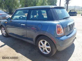 2010 MINI Cooper Hardtop with VIN WMWMF3C56ATZ24156, listed as a IAAI auction lot 41997887 with 149,308 mi miles. Bid and sale history available at carsss.com. Image 3.