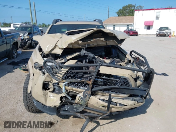 2018 Toyota Tacoma SR5 z VIN 3TMDZ5BN4JM039802, wystawiony jako IAAI lot #42300924 z przebiegiem 48 828 mil mil oraz . Historia ofert i sprzedaży dostępna na DreamBid. Obrazek 12.