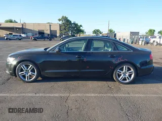 2014 Audi A6 Premium Plus with VIN WAUGFAFC7EN014764, listed as a IAAI auction lot 42261384 with 117,285 mi miles and . Bid and sale history available at DreamBid. Image 14.