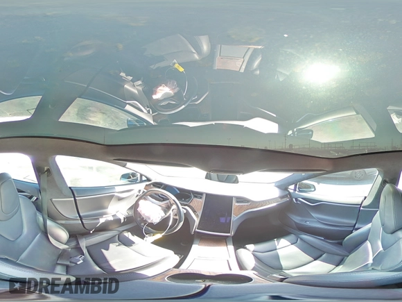 2019 Tesla Model S 75D with VIN 5YJSA1E2XKF305595, listed as a Copart auction lot 51838965 with Not provided miles and Salvage title. Bid and sale history available at DreamBid. Image 13.