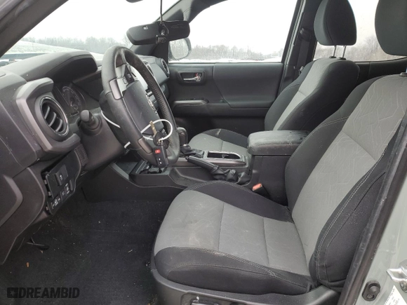 2023 Toyota Tacoma 4WD SR with VIN 3TMCZ5AN5PM574255, listed as a Copart auction lot 87945995 with 33,016 mi miles and Salvage Title. Bid and sale history available at carsss.com. Image 7.