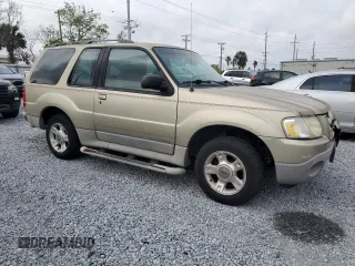 2002 Ford Explorer Sport Value with VIN 1FMYU60EX2UC31677, listed as a Copart auction lot 46415785 with 104,684 mi miles and Salvage title. Bid and sale history available at DreamBid. Image 4.