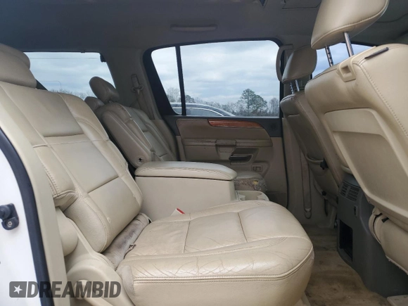 2010 Infiniti QX56 with VIN 5N3ZA0NE7AN901169, listed as a Copart auction lot 46459555 with 210,210 mi miles and Salvage Title. Bid and sale history available at DreamBid. Image 11.