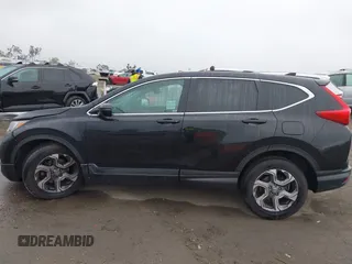 2018 Honda CR-V EX with VIN 2HKRW1H5XJH512641, listed as a IAAI auction lot 41920032 with 70,995 mi miles. Bid and sale history available at carsss.com. Image 14.