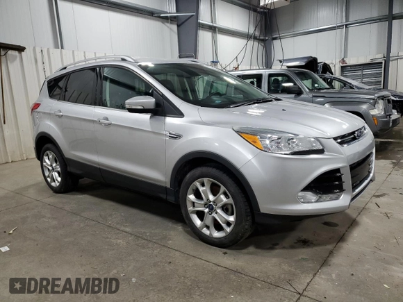2016 Ford Escape Titanium with VIN 1FMCU9J95GUC27654, listed as a Copart auction lot 51950575 with 101,220 mi miles and Salvage Title. Bid and sale history available at carsss.com. Image 4.