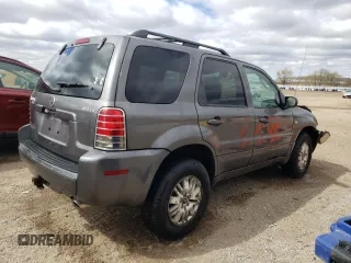 2005 Mercury Mariner Luxury z VIN 4M2YU57185DJ27043, wystawiony jako Copart lot #52980555 z przebiegiem 152 406 mil mil oraz Szkoda całkowita • Salvage title. Historia ofert i sprzedaży dostępna na DreamBid. Obrazek 3.