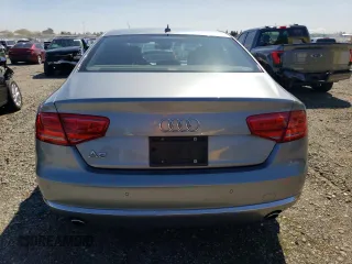 2013 Audi A8 3.0L z VIN WAUAGAFD8DN033639, wystawiony jako Copart lot #50001435 z przebiegiem 192 919 mil mil oraz Szkoda całkowita • Salvage title. Historia ofert i sprzedaży dostępna na DreamBid. Obrazek 6.