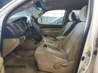 2011 Toyota Tacoma with VIN 3TMMU4FN8BM026877, listed as a Copart auction lot 65326895 with 214,919 mi miles and Clean title. Bid and sale history available at DreamBid. Image 7.