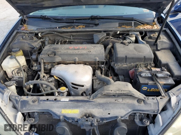 2005 Toyota Camry STD z VIN 4T1BE32K15U062271, wystawiony jako Copart lot #55957155 z przebiegiem 187 231 mil mil oraz Szkoda całkowita • Salvage title. Historia ofert i sprzedaży dostępna na DreamBid. Obrazek 11.