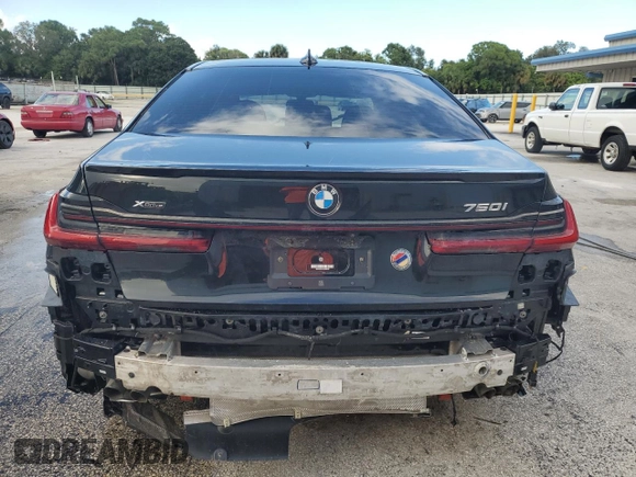 2022 BMW 7 Series 750i xDrive with VIN WBA7U2C01NCK83702, listed as a Copart auction lot 74327704 with Not provided miles and Salvage title. Bid and sale history available at DreamBid. Image 6.