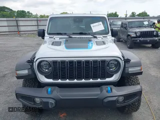 2024 Jeep Wrangler Rubicon with VIN 1C4RJXR61RW224506, listed as a IAAI auction lot 42111434 with 33,689 mi miles and . Bid and sale history available at DreamBid. Image 12.