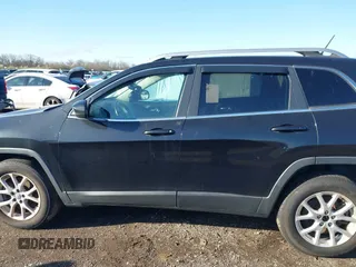 2014 Jeep Cherokee Latitude z VIN 1C4PJMCS2EW124467, wystawiony jako IAAI lot #41944747 z przebiegiem 132 890 mil mil oraz . Historia ofert i sprzedaży dostępna na DreamBid. Obrazek 14.