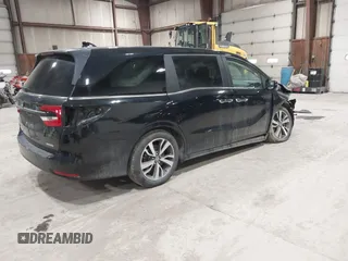2024 Honda Odyssey Touring z VIN 5FNRL6H80RB044915, wystawiony jako IAAI lot #41921539 z przebiegiem 13 425 mil mil oraz . Historia ofert i sprzedaży dostępna na DreamBid. Obrazek 4.