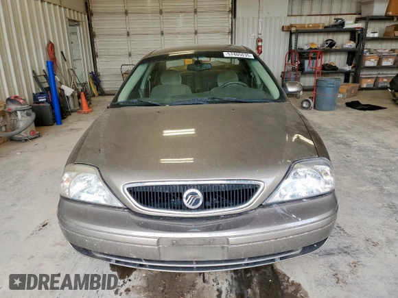 2002 Mercury Sable GS z VIN 1MEFM50U02G652804, wystawiony jako Copart lot #57405035 z przebiegiem 264 042 mil mil oraz Szkody całkowita. Historia ofert i sprzedaży dostępna na DreamBid. Obrazek 5.