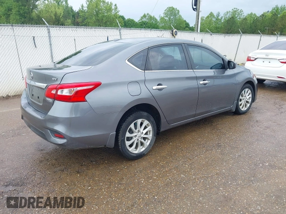 2019 Nissan Sentra S z VIN 3N1AB7AP7KY364754, wystawiony jako IAAI lot #42056332 z przebiegiem 170 068 mil mil oraz . Historia ofert i sprzedaży dostępna na DreamBid. Obrazek 4.