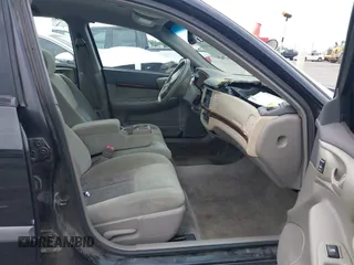 2004 Chevrolet Impala with VIN 2G1WF52E349136173, listed as a IAAI auction lot 42149870 with 165,215 mi miles. Bid and sale history available at carsss.com. Image 5.