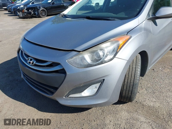 2013 Hyundai Elantra GT with VIN KMHD35LE6DU084154, listed as a IAAI auction lot 42079602 with 194,314 mi miles. Bid and sale history available at carsss.com. Image 6.