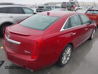 2013 Cadillac XTS Luxury with VIN 2G61P5S32D9115640, listed as a IAAI auction lot 41065284 with 125,643 mi miles and . Bid and sale history available at carsss.com. Image 4.