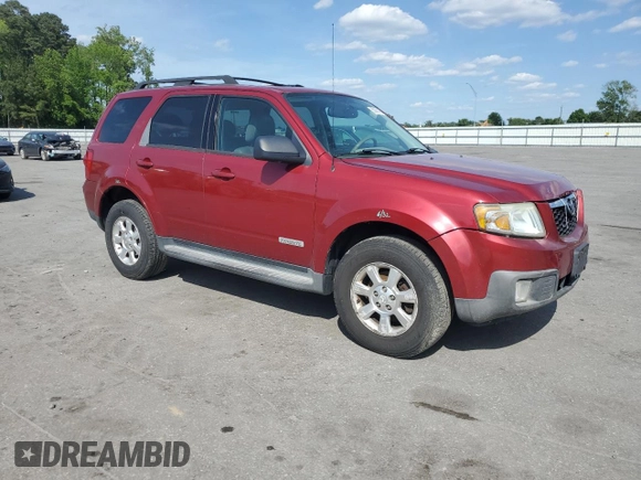 2008 Mazda Tribute Touring with VIN 4F2CZ96108KM14483, listed as a Copart auction lot 55091955 with 133,397 mi miles and Salvage Title. Bid and sale history available at DreamBid. Image 4.
