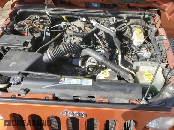 2010 Jeep Wrangler Rubicon with VIN 1J4BA6D17AL208835, listed as a Copart auction lot 41851855 with 107,771 mi miles and Salvage title. Bid and sale history available at DreamBid. Image 11.