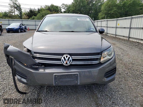 2013 Volkswagen Tiguan S с VIN WVGBV3AX6DW592011, выставлен на аукционе Copart как лот 59802095 с пробегом 112 485 миль миль и Списание • Salvage title. История ставок и продаж доступна на DreamBid. Изображение 5.