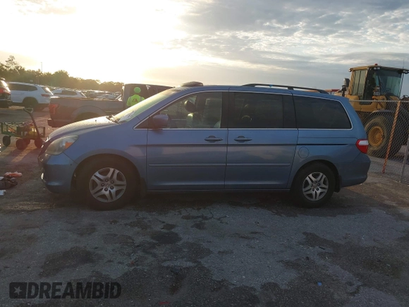 2007 Honda Odyssey EX-L z VIN 5FNRL38717B035384, wystawiony jako IAAI lot #41976861 z przebiegiem 211 640 mil mil oraz . Historia ofert i sprzedaży dostępna na DreamBid. Obrazek 14.