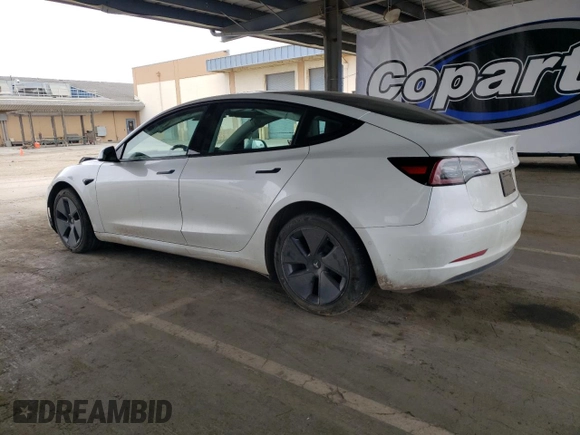 2022 Tesla Model 3 Long Range with VIN 5YJ3E1EB2NF267485, listed as a Copart auction lot 54952505 with 30,569 mi miles and Clean Title. Bid and sale history available at DreamBid. Image 2.