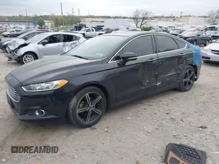 2016 Ford Fusion SE with VIN 3FA6P0HD0GR205184, listed as a IAAI auction lot 42044218 with 136,262 mi miles. Bid and sale history available at carsss.com. Image 2.