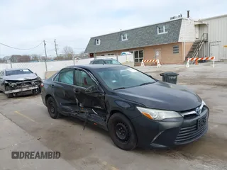 2015 Toyota Camry LE with VIN 4T1BD1FK6FU157623, listed as a IAAI auction lot 42015005 with 300,974 mi miles and . Bid and sale history available at DreamBid. Image 1.
