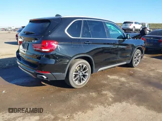 2018 BMW X5 xDrive35i with VIN 5UXKR0C59J0X87391, listed as a IAAI auction lot 41359822 with 73,913 mi miles. Bid and sale history available at carsss.com. Image 4.