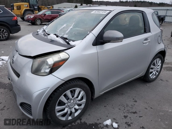 2012 Scion iQ with VIN JTNJJXB03CJ018641, listed as a Copart auction lot 82653104 with 118,617 mi miles and Salvage Title. Bid and sale history available at carsss.com. Image 1.