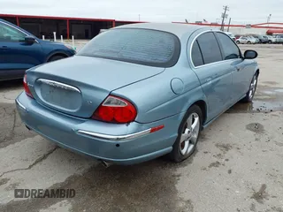 2003 Jaguar S-Type with VIN SAJEA01U33HM70079, listed as a IAAI auction lot 41939388 with 147,975 mi miles and . Bid and sale history available at DreamBid. Image 4.