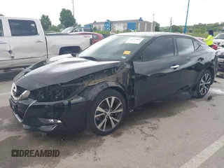 2017 Nissan Maxima Platinum z VIN 1N4AA6AP4HC403592, wystawiony jako IAAI lot #42177002 z przebiegiem 112 105 mil mil oraz . Historia ofert i sprzedaży dostępna na DreamBid. Obrazek 18.