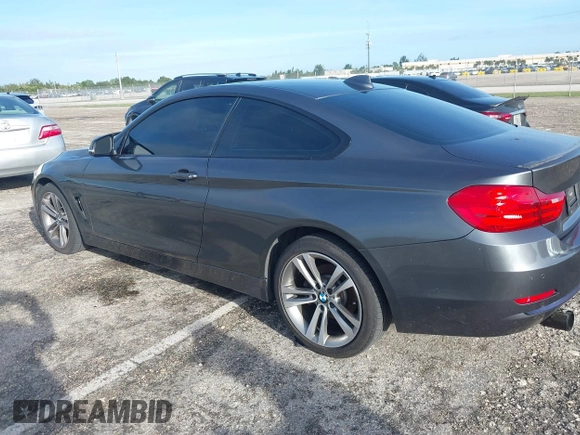 2014 BMW 4 Series 428i xDrive with VIN WBA3N5C57EK196790, listed as a IAAI auction lot 40571670 with 108,114 mi miles and . Bid and sale history available at DreamBid. Image 3.