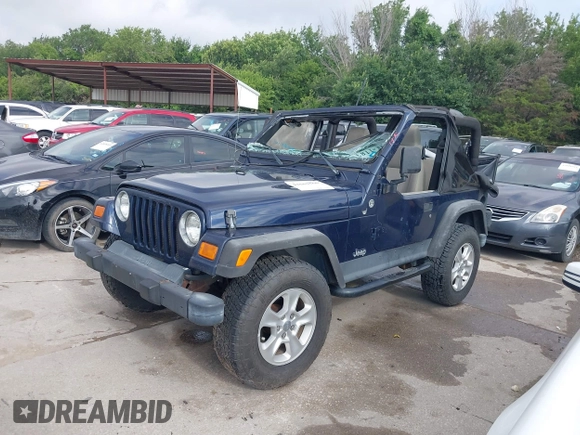 2006 Jeep Wrangler SE with VIN 1J4FA29156P739521, listed as a IAAI auction lot 42563566 with 117,281 mi miles and . Bid and sale history available at DreamBid. Image 14.