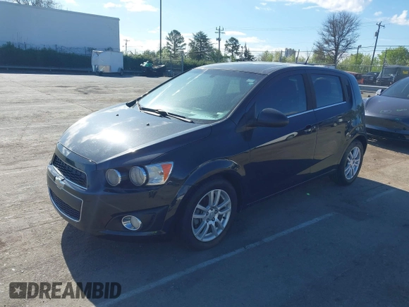 2014 Chevrolet Sonic LT with VIN 1G1JC6SB4E4151333, listed as a IAAI auction lot 41815985 with 112,123 mi miles. Bid and sale history available at carsss.com. Image 2.