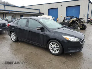 2017 Ford Focus SE with VIN 1FADP3F2XHL316724, listed as a Copart auction lot 52321155 with 137,005 mi miles and Salvage Title. Bid and sale history available at DreamBid. Image 4.