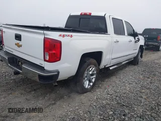 2016 Chevrolet Silverado 1500 LTZ with VIN 3GCUKSEC5GG343533, listed as a IAAI auction lot 41202553 with 207,973 mi miles and . Bid and sale history available at DreamBid. Image 4.