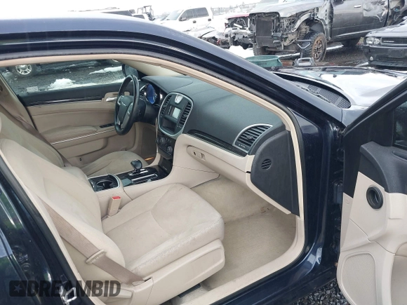 2012 Chrysler 300 with VIN 2C3CCAAG7CH142422, listed as a IAAI auction lot 41555202 with 134,864 mi miles and . Bid and sale history available at DreamBid. Image 5.