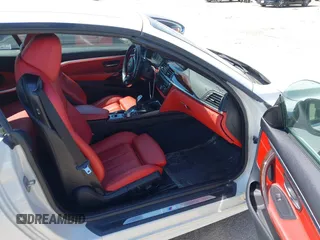 2015 BMW 4 Series 428i z VIN WBA3V7C52FP771779, wystawiony jako IAAI lot #41953647 z przebiegiem 66 003 mil mil oraz . Historia ofert i sprzedaży dostępna na DreamBid. Obrazek 5.