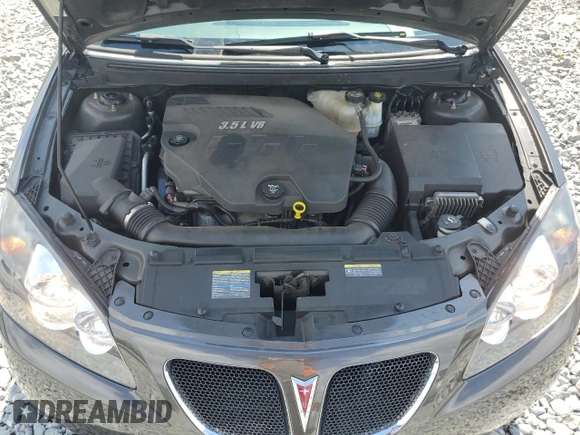 2007 Pontiac G6 GT with VIN 1G2ZH18NX74127920, listed as a Copart auction lot 52950365 with 127,428 mi miles and Salvage title. Bid and sale history available at DreamBid. Image 11.