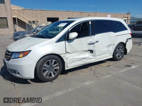 2015 Honda Odyssey Touring Elite with VIN 5FNRL5H91FB038099, listed as a IAAI auction lot 41829649 with 167,017 mi miles and . Bid and sale history available at DreamBid. Image 19.